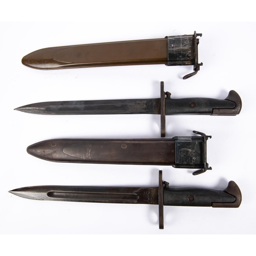 356 - A Garand knife bayonet 1943MI, dated 1942 with steel scabbard; also a similar 1943MI with plastic sc... 