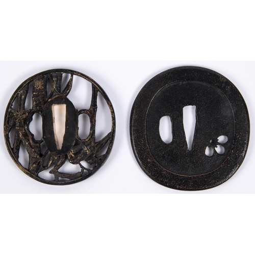 364 - A Japanese cast brass tsuba, pierced and embossed with reeds and bamboo; and a plain blackened cast ... 