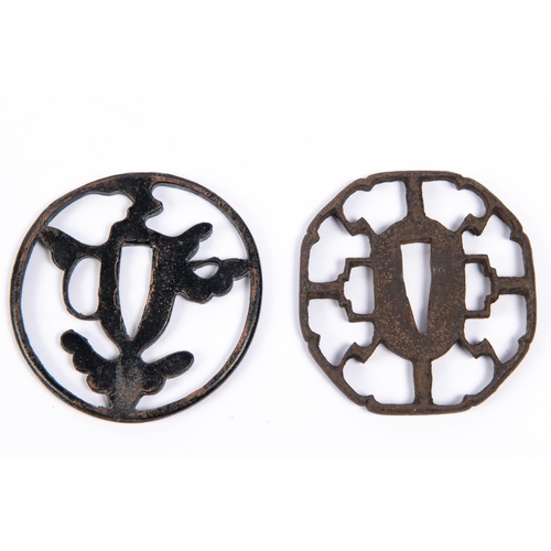 366 - An old Japanese pierced iron tsuba (rusted overall); and a crude blackened cast bronze tsuba. GC (2)... 