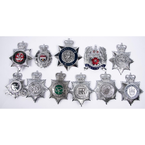 40 - 11 different ERII police chrome finish helmet plates, including 3 enamelled and 3 plastic 