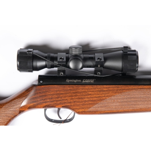 401 - A .22” Remington sabre break action air rifle, fitted with SMK 4 x 30 telescopic sight, silencer and... 