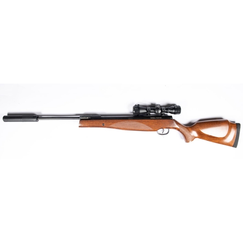 401 - A .22” Remington sabre break action air rifle, fitted with SMK 4 x 30 telescopic sight, silencer and... 