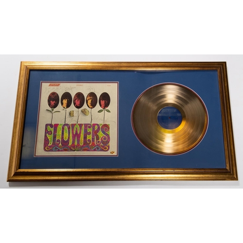 4 - A framed 'gold disc' of the Rolling Stones' album 'Flowers'. Includes; all 5 band members; Mick Jagg... 