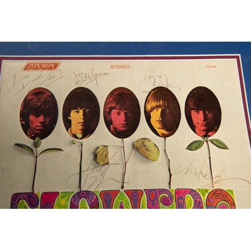 4 - A framed 'gold disc' of the Rolling Stones' album 'Flowers'. Includes; all 5 band members; Mick Jagg... 