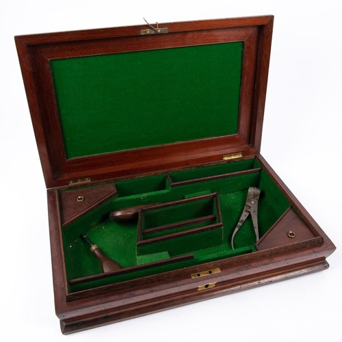 413 - A cutlery case relined professionally to receive a pair of duelling pistols, containing a copper pis... 