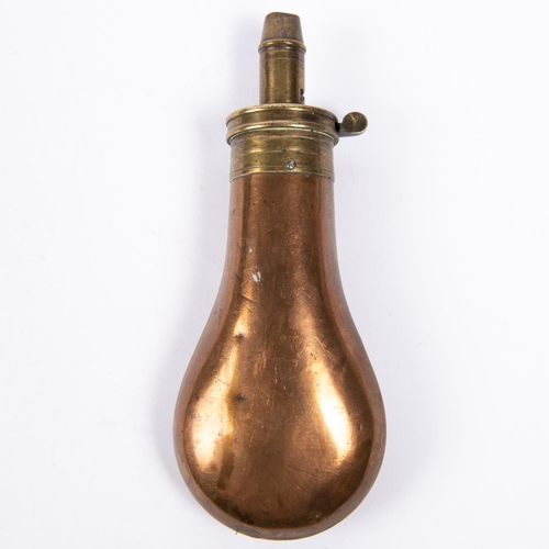 421 - A plain copper powder flask 6½