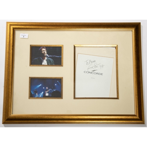 7 - Framed signature of Eric Clapton on Concorde Menu, together with 2x photographs. A Framed signature ... 