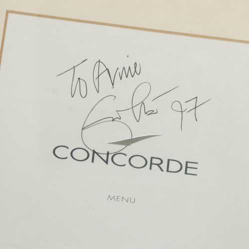 7 - Framed signature of Eric Clapton on Concorde Menu, together with 2x photographs. A Framed signature ... 