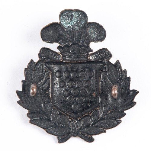 292 - A blackened brass glengarry badge of the 1st Admin Bn Cornwall Rifle Volunteers (pre 1881), worn by ... 