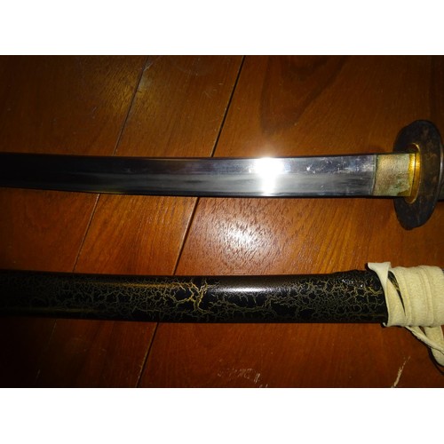 371 - A Japanese sword katana, blade 25½” (polished), the tang with checked file marks and signed with thr... 