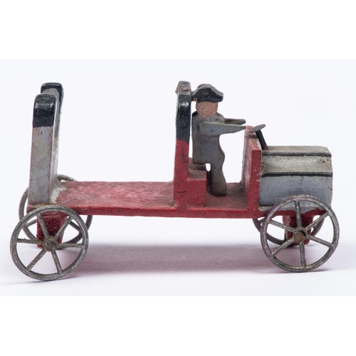 179 - A rare early Edwardian wooden Penny Toy style car. In light grey and red, with driver and fitted wit... 