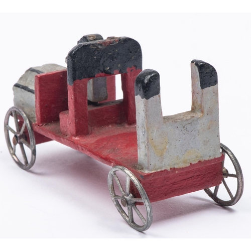 179 - A rare early Edwardian wooden Penny Toy style car. In light grey and red, with driver and fitted wit... 