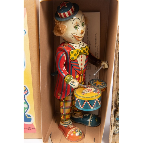 200 - A quantity of Tinplate Toys. Clockwork Clown Trainer & Acrobatic Dog with Fire Ring, made by Capital... 