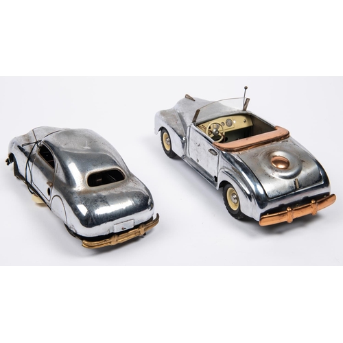 206 - 2 Italian produced plated tinplate clockwork musical cars. A 1950's Buick style 2 seat open tourer, ... 