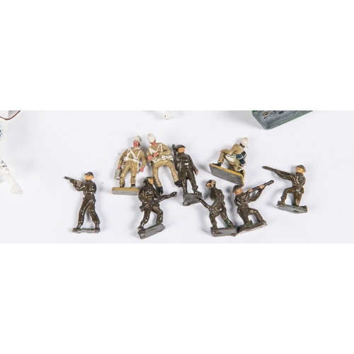 218 - A quantity of Soldiers by Britains etc. Guardsmen including Mounted examples, Infantrymen, Stretcher... 