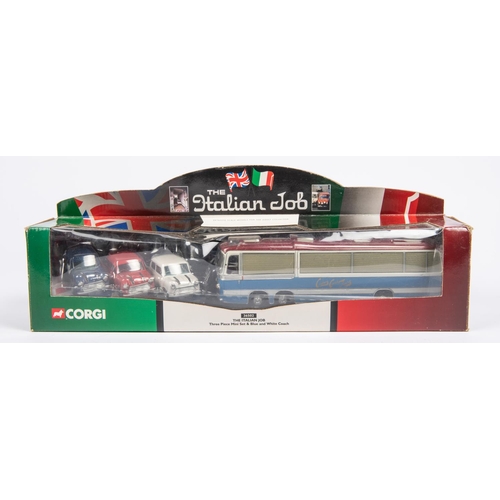 360 - A Corgi 'The Italian Job' set (36502). Containing 3x Minis and Bedford coach in blue and silver. Box... 