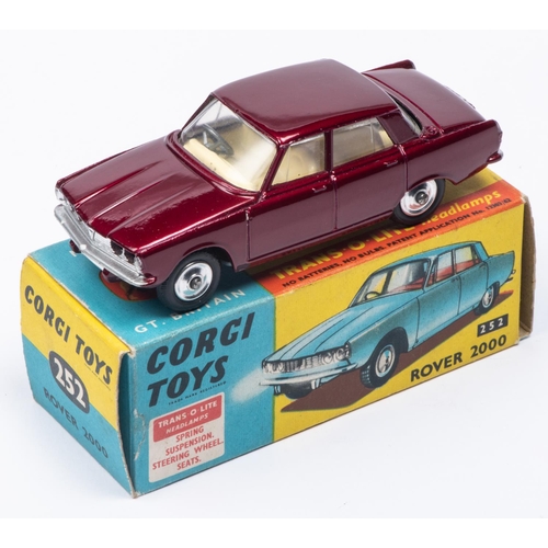 381 - A Corgi Toys Rover 2000 (252) in metallic maroon with cream interior. Boxed, minor wear. Vehicle VGC... 