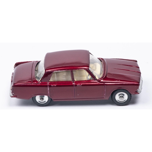 381 - A Corgi Toys Rover 2000 (252) in metallic maroon with cream interior. Boxed, minor wear. Vehicle VGC... 