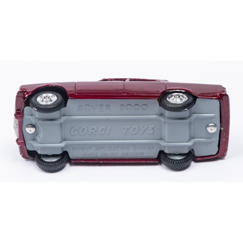 381 - A Corgi Toys Rover 2000 (252) in metallic maroon with cream interior. Boxed, minor wear. Vehicle VGC... 