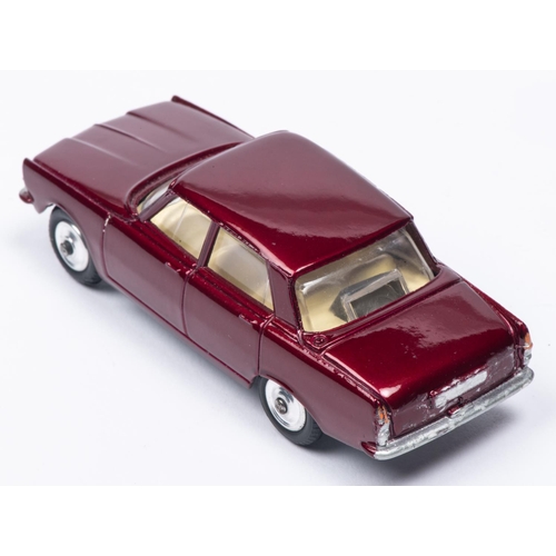 381 - A Corgi Toys Rover 2000 (252) in metallic maroon with cream interior. Boxed, minor wear. Vehicle VGC... 