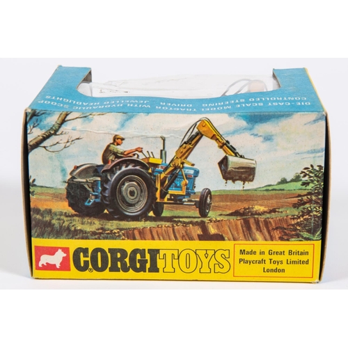 383 - A Corgi Toys Ford Super Major Tractor with Hydraulic Scoop (74). Tractor in blue with yellow arm and... 