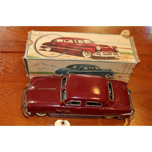 214 - A late 1940's American style tinplate clockwork saloon/ sedan. A German example made by S.G (Gunther... 