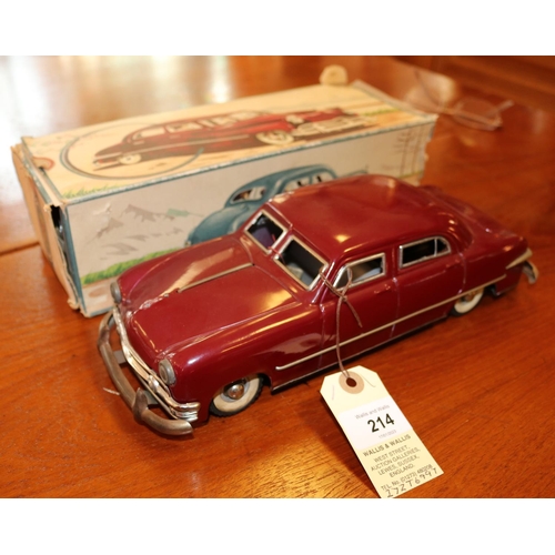 214 - A late 1940's American style tinplate clockwork saloon/ sedan. A German example made by S.G (Gunther... 