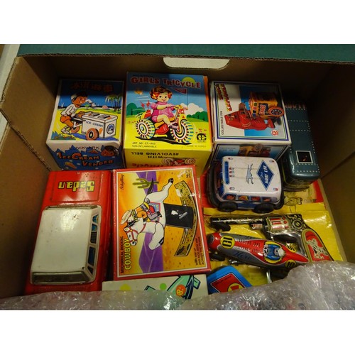 202 - A quantity of Small Tinplate Vehicles and other items. Vehicles include Police, Fire, Ambulance, Tax... 