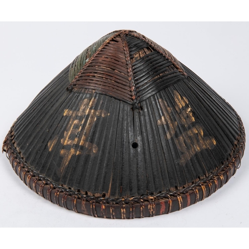 18 - An interesting Boxer Rebellion period Chinese plaited bamboo conical hat, painted red and black with... 