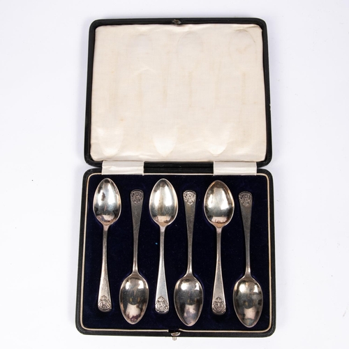 20 - A set of 6 silver regimental prize teaspoons, the stems terminating in the  badge and cypher of the ... 