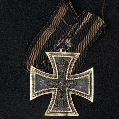 229 - A Prussian 1870 Iron Cross, 2nd class, with integral horizontal loop and no ring suspender, sewn dir... 