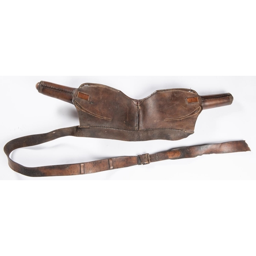 271 - A good pair of mid 19th century cavalry leather saddle holsters, with girth strap. GC (some cracking... 