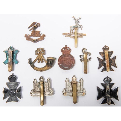 290 - Eleven various cap badges: small cast KRRC officers, CLB Cadets KRRC, Huntingdonshire Cyclists or Ho... 