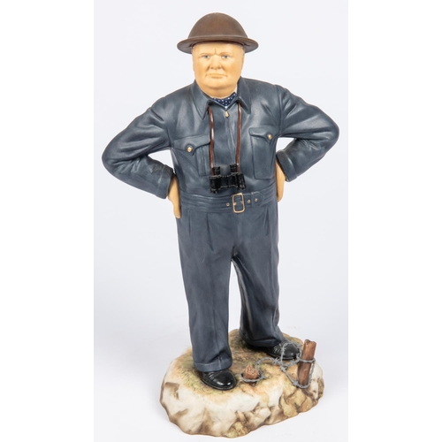 30 - An Ashmore porcelain figure of Sir Winston Churchill, model no 13, standing wearing siren suit, stee... 