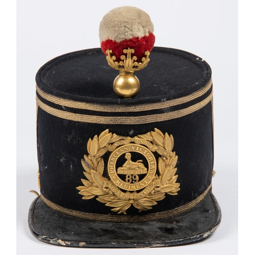 305 - An 1869 pattern officer's shako of the 89th Regiment, blue cloth with gilt lace piping, original bal... 