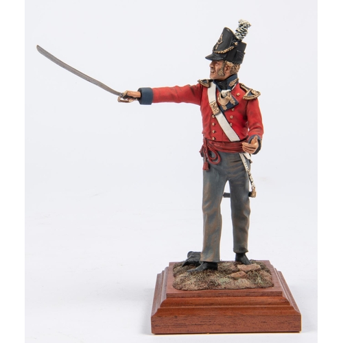 37 - A good Charles Stadden figurine of a Waterloo Period Gunner, with polished wood base, height 12