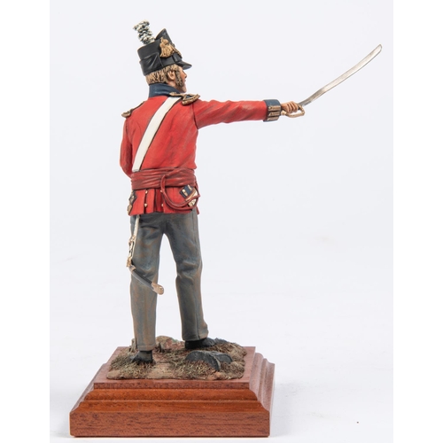 37 - A good Charles Stadden figurine of a Waterloo Period Gunner, with polished wood base, height 12