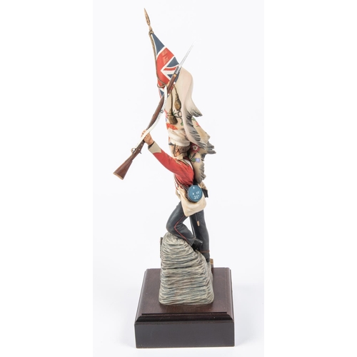 39 - A good Charles Stadden figure of a 31st Regt sergeant with the Colours at the battle of Sobraon, hei... 