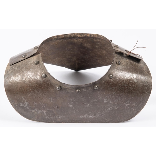 391 - A 17th century cavalry troopers' steel gorget armour, constructed in 2 halves and decorated with dom... 