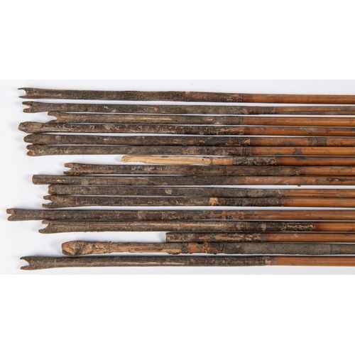 399 - A set of sixteen 18th century Indian arrows, with diamond and rectangular section heads, cane shafts... 