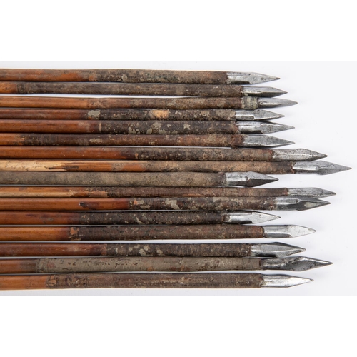 399 - A set of sixteen 18th century Indian arrows, with diamond and rectangular section heads, cane shafts... 