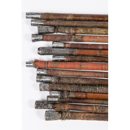 400 - Fifteen 18th century Indian arrows, with simple flat nosed heads for punching through leather (one w... 