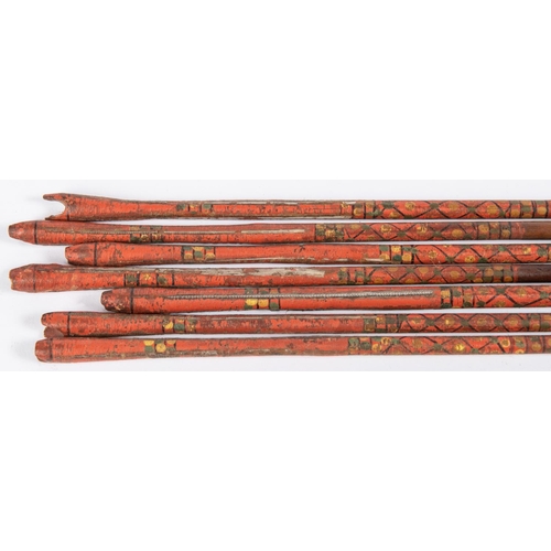 402 - A set of seven 18th century Indian arrows, with small rectangular section heads, cane shafts with pa... 