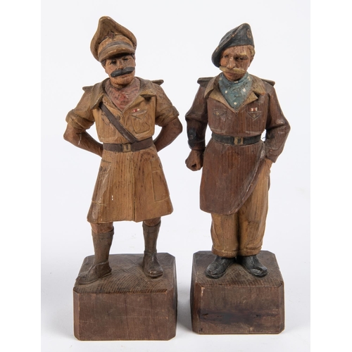 41 - A most unusual pair of carved wood figures: The Two Types, the famous WWII cartoon army officers, he... 