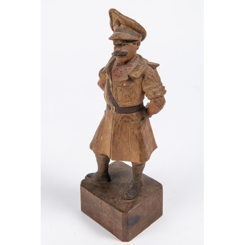 41 - A most unusual pair of carved wood figures: The Two Types, the famous WWII cartoon army officers, he... 