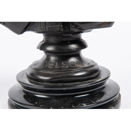 44 - A heavy bronze bust of Nelson, mounted on a black marble base, height 14