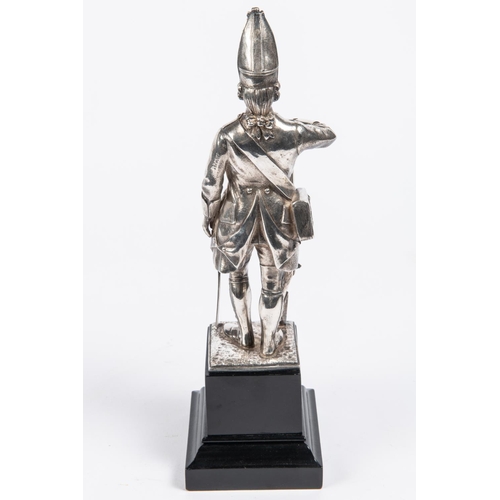 46 - A good silver figurine of a 1745 Grenadier, mounted on an ebonised plinth, London HM on base, height... 