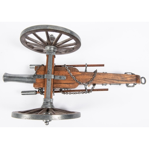 58 - A model of a Waterloo period field gun, barrel 7½