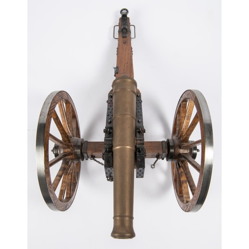 59 - A well made model of a Waterloo period field gun, turned brass barrel 9½