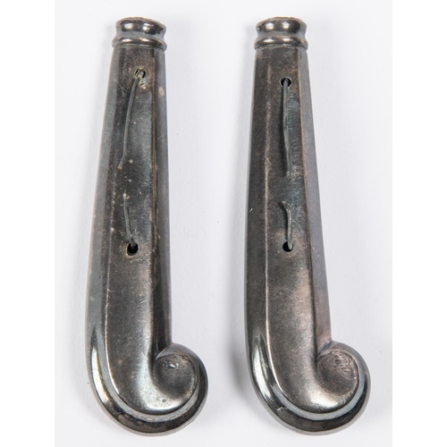 64 - A pair of silver coloured pistol grip dinner knife handles, reputed to have come from Nelson's cutle... 